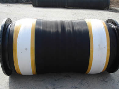 A dredge hose is on the ground.